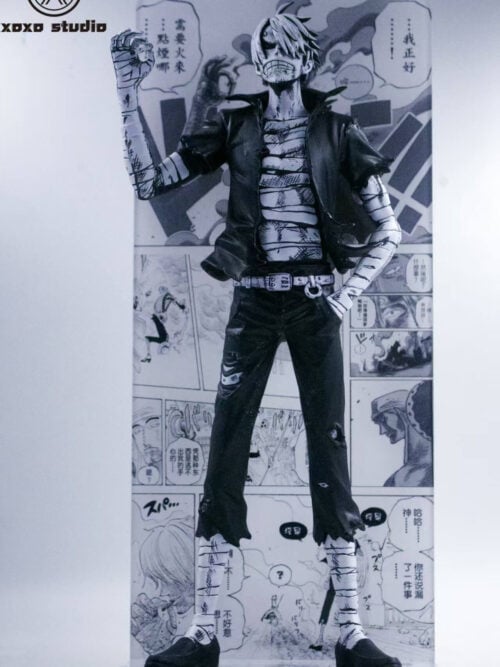 Full front view of XOXO Studio's black-and-white Sanji figure holding a cigarette, with bandaged limbs and a manga-panel backdrop.