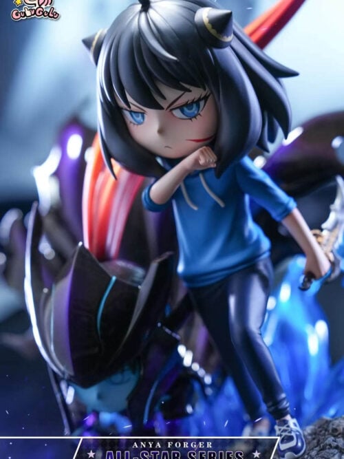 Close-up of black-haired, blue-eyed Anya with a red cheek mark, raised forearm and blue hoodie beside dark armor.