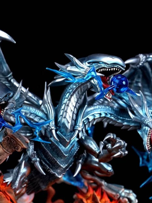 Close-up of Blue-Eyes Ultimate Dragon's three open jaws, blue energy spheres, silver-blue neck plates and raised claws.