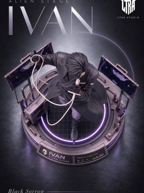 Overhead view of the LTRA Studio Ivan statue highlighting the grid-patterned circular stage floor, angled monitor screens, speaker box, and looped microphone cord