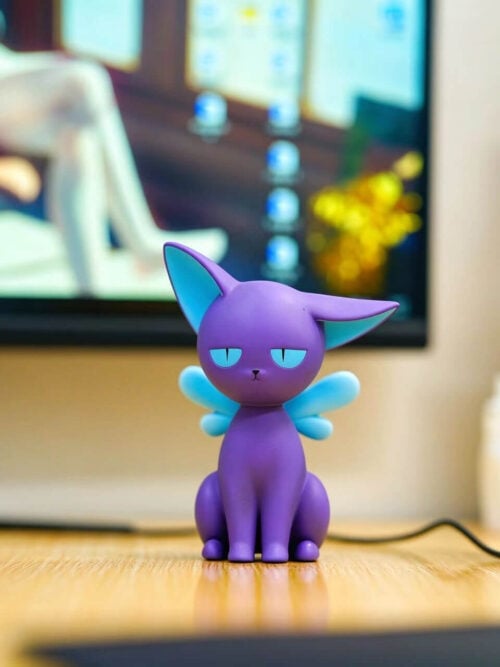 Front view of LD Studio's seated Spinel Sun figure, showing half-lidded blue eyes, pointed ears and pale blue wings.