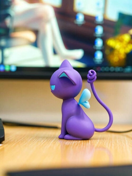 Side view of the purple Spinel Sun figure facing left, with pale blue wings and a raised tail ending in a tight curl.