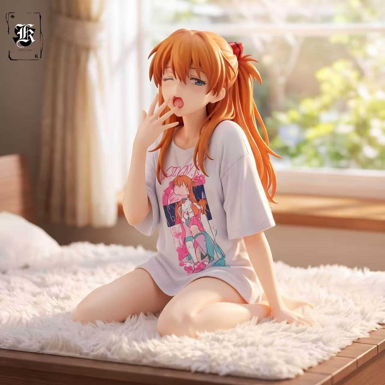 Asuka Langley Soryu - Seated Yawning Full View Asuka Langley Soryu figure seated with folded legs in a white graphic T-shirt, one hand raised to her mouth, on a white fluffy surface.