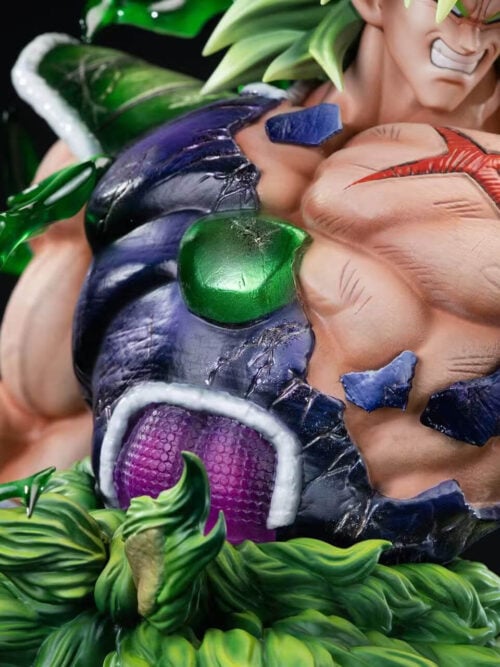 Close-up of Broly's scarred chest, broken purple and green armor, green lightning-shaped effects and textured waist pelt.