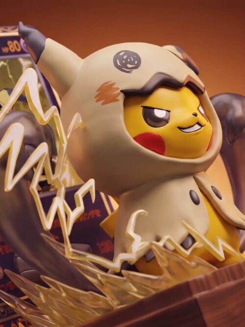 Close-up of Pikachu's face inside a cream Mimikyu hood, with scribbled costume eyes, dark claws and angular yellow lightning.