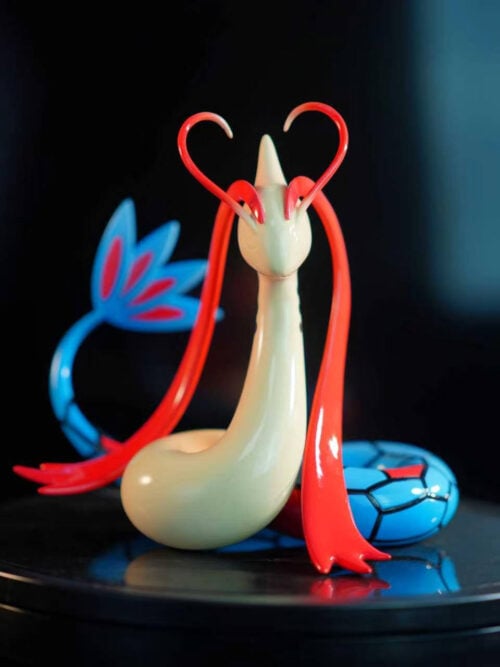 Front view of LD Studio's Milotic figure with curled red antennae, long red head fins and a raised blue-and-red tail fan.