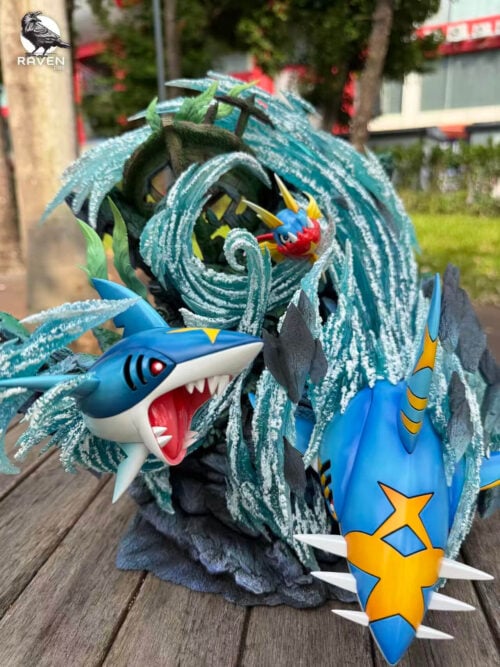 Portrait view of Sharpedo's open jaws, Mega Sharpedo's spiked snout and Carvanha inside a water spiral above the rocky base.