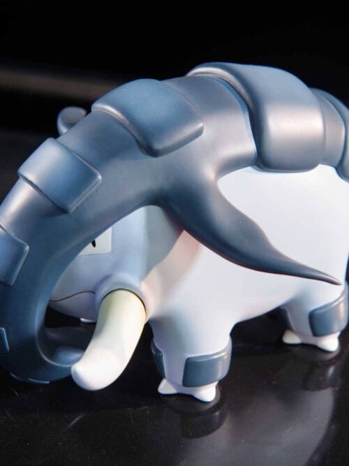 High-angle three-quarter view of LD Studio Donphan figure on a black turntable, showing the segmented dark armor ridge along its back and trunk.