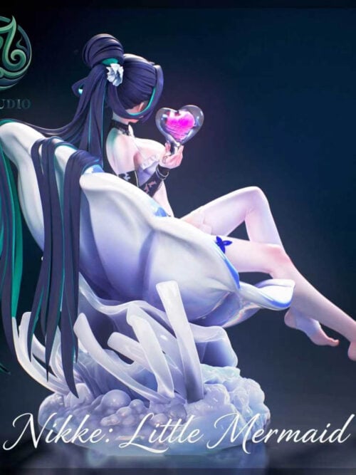 Side-back angle of XF Studio Little Mermaid from Goddess of Victory: Nikke showing long dark and teal hair draping over the back of the shell throne and coral base.