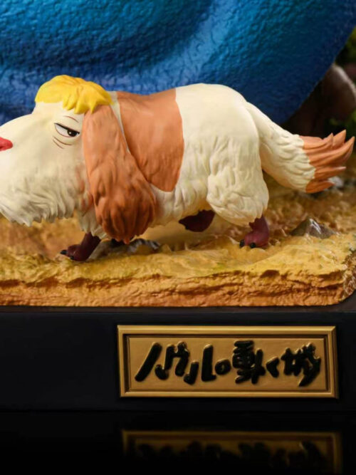 Close-up of Heen walking along the sculpted dirt path above the black base and gold-toned Japanese title plaque.