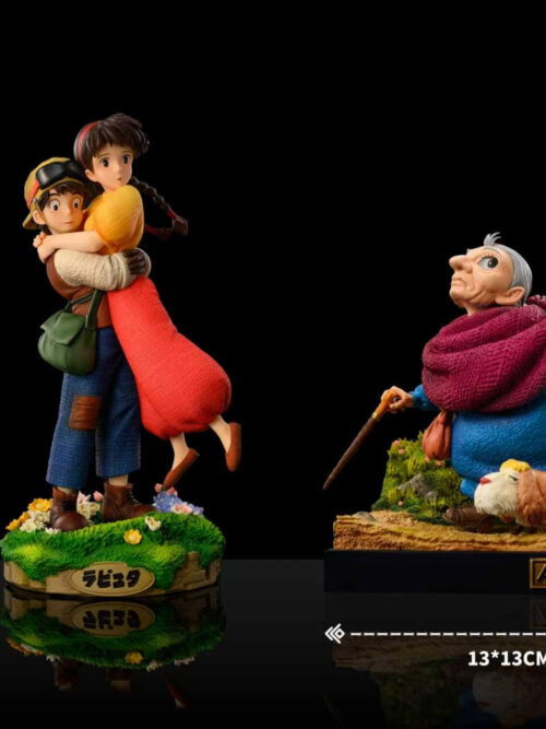 Dimensions card showing the 13 by 13 by 16 cm Sophie and Heen statue next to a soda can and a Castle in the Sky figure.