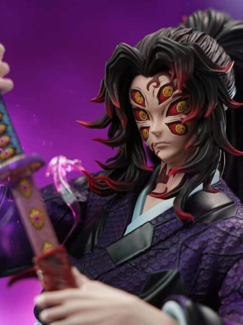 Close-up of DreamHunter Studio 1/6 scale Kokushibo statue showing his six-eyed face, flame-like markings, and right hand gripping the eye-patterned katana hilt