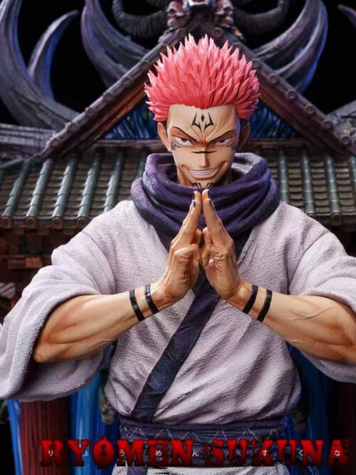 Front upper-body close-up of the RealWorld Studio Ryomen Sukuna statue showing his wide toothy grin, facial markings, mudra hand sign, and wide kimono sleeves before the horned shrine roof.