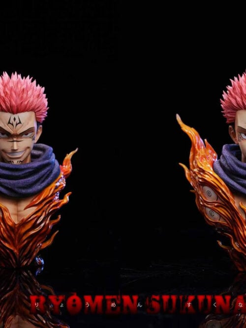 Side-by-side view of the two interchangeable Ryomen Sukuna head sculpts—a wide grin on the left and a closed-mouth smirk on the right—mounted on the flame-rimmed bust stand with sculpted eyes.