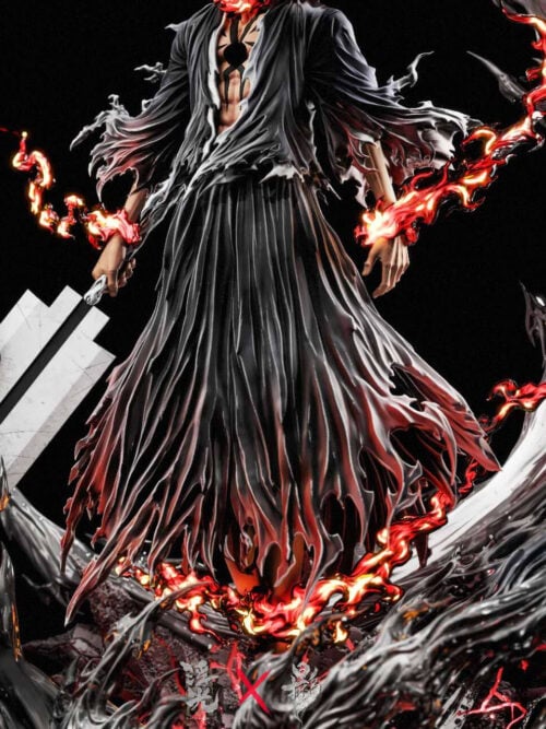 Mid-section view of the Ichigo Kurosaki statue showing the Hollow chest hole, tattered black robes, red wrist and hem effects, stepped white sword with black spikes, and sweeping crescent wave.