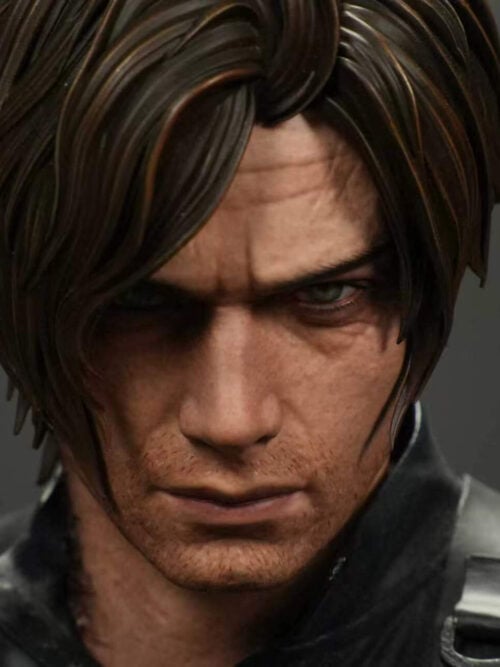 Front close-up of Leon Scott Kennedy's head sculpt showing parted brown hair, furrowed brow, light eyes, facial stubble, and black shoulder harness straps.