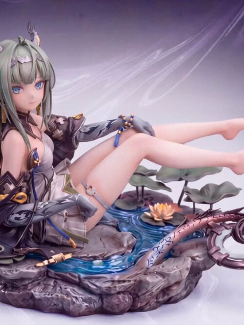 Full three-quarter view of Ciel Indigo Studio's 1/6-scale Si statue from Arknights: Endfield seated on a rocky stream base with lotus leaves, an open water lily, raised bare feet, and a ring-tipped dragon tail.