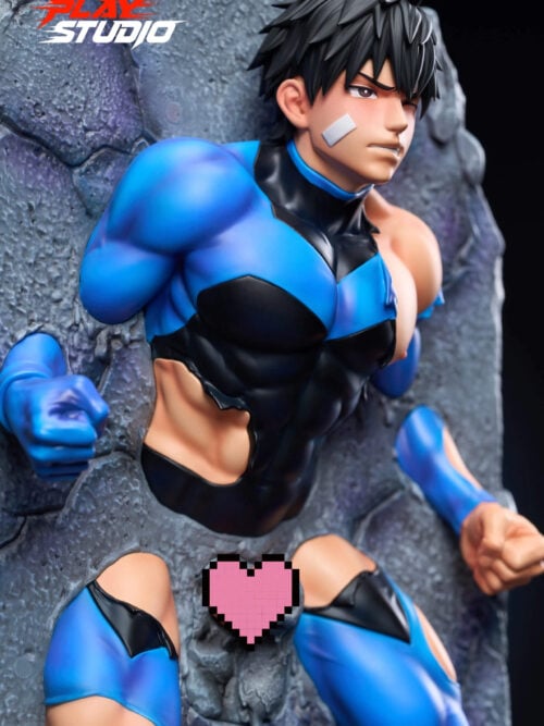 Angled view of the statue’s head and torso in the stone slab, showing spiky black hair, a white cheek bandage, and the torn blue-and-black suit, with fists extending from the rock. A pink pixel heart appears near the lower center.