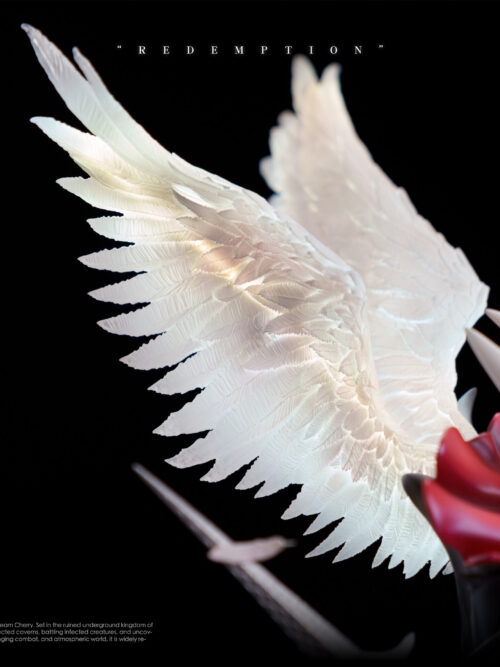 Close-up detail of the sculpted white feathered wings with internal warm illumination behind Hornet on the Redemption statue.