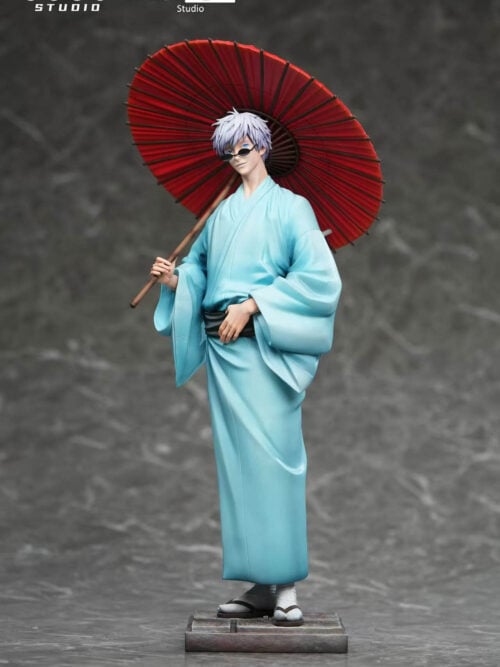 Adult Satoru Gojo 1/6 figure by GUGU Studio and MIMO Studio wearing a pale blue yukata, dark sash, round sunglasses, and geta while resting a red umbrella on his shoulder against a dark grey background.