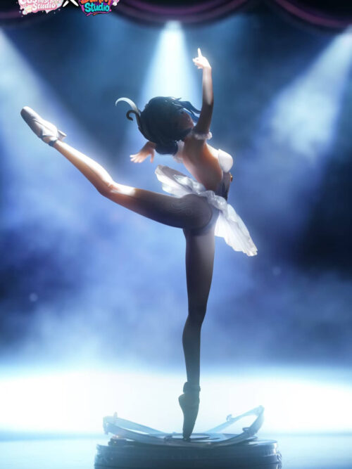 Full-body backlit silhouette view of the Odette Spessiva figure balanced en pointe on the circular base under stage spotlights, highlighting the translucent tutu skirt.
