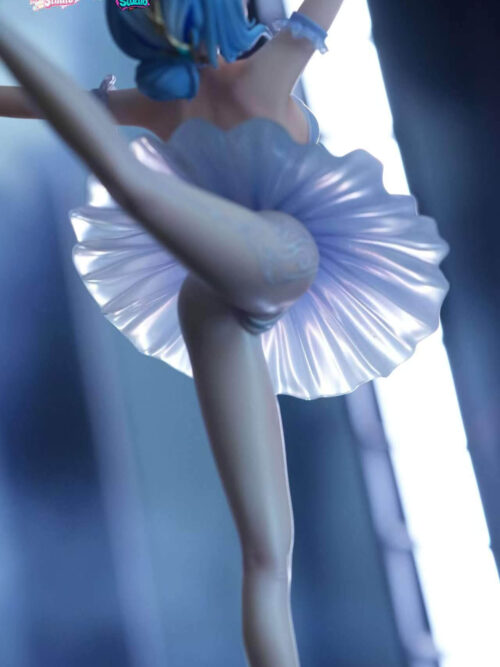 Low-angle rear view of the Odette Spessiva figure looking up toward the translucent pleated tutu skirt, blue hair bun, and extended left leg.