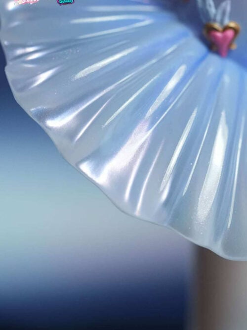Close-up of the upper pleated surface of the translucent blue tutu skirt and the pink heart waist ornament on the Odette Spessiva figure.
