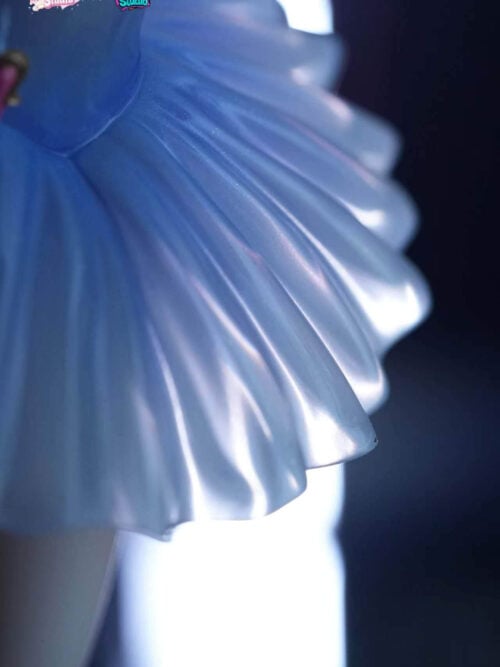 Macro close-up of the pleated translucent blue PU tutu skirt on the Odette Spessiva figure showing its pearlescent surface finish.