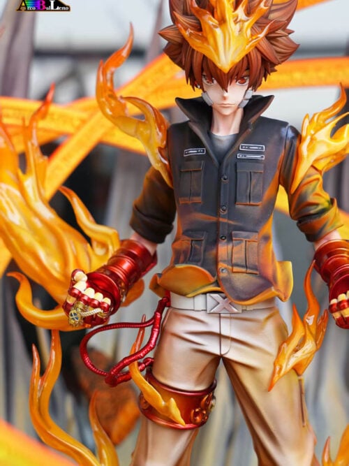 Vertical close-up of the Tsunayoshi Sawada figure from the thighs up, highlighting his forehead flame, dark jacket, red gauntlets, and thigh band.