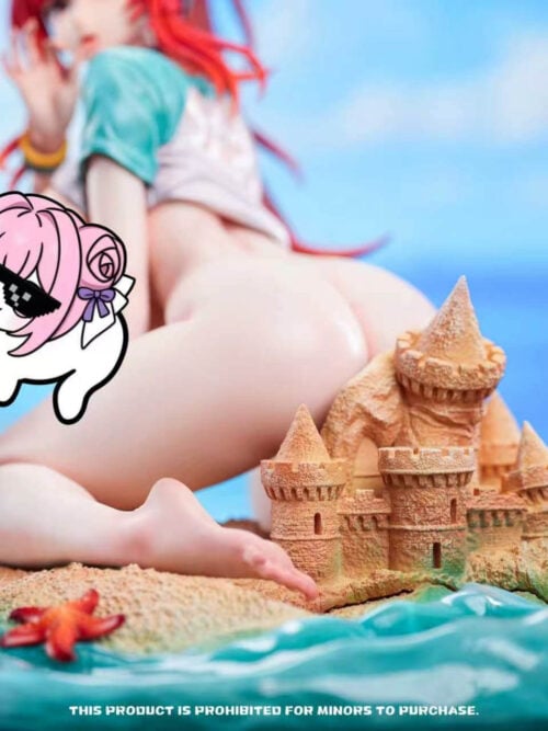 Close view of the statue base with a tan sandcastle, translucent turquoise wave edge, red starfish, seashells, and parts of the kneeling figure and small pink-haired companion.