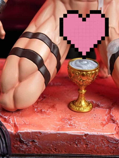 Close-up of the kneeling figure’s strapped thighs and chained wrists on a textured red platform, with a gold chalice of white material and a black multi-strand whip beside the base. A pink pixel graphic covers the center.