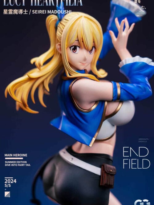 Close-up of the Lucy Heartfilia figure highlighting her facial expression, blonde hair with blue ribbon, cropped blue jacket with gold trim, and black skirt