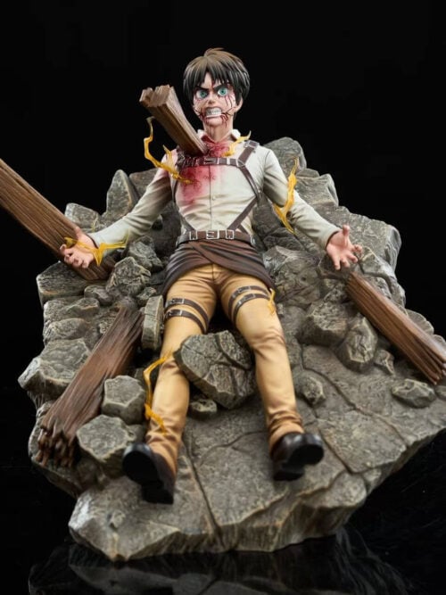 Front view of the KX Studio Eren Jaeger Bursting from the Ruins statue lying on a sloped rocky rubble base with splintered wooden beams, a beam impaling his chest, and yellow lightning effects.