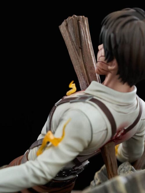 Rear-left close-up of Eren Jaeger's head and upper back showing the wooden beam exiting through his blood-stained shirt and harness straps.