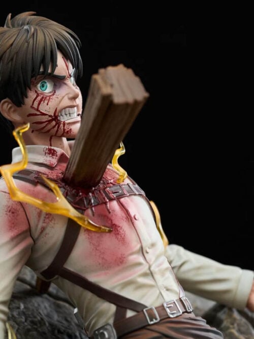 Close-up of the Eren Jaeger head sculpt and chest from the right angle, highlighting the blood markings, wide green eyes, clenched teeth, impaled wooden beam, and yellow lightning effect.
